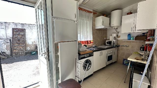 Imagen 8 Inmueble 305043 - Casa Aislada en venta en Pinarnegrillo / Fachada de cemento con revestimiento de piedra