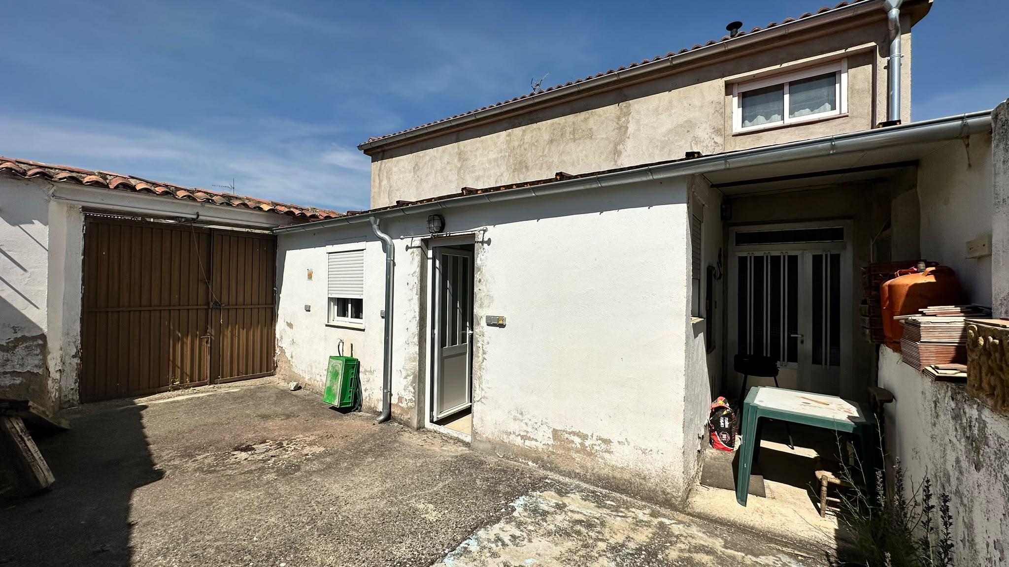 Imagen 12 Casa Aislada en venta en Pinarnegrillo / Fachada de cemento con revestimiento de piedra