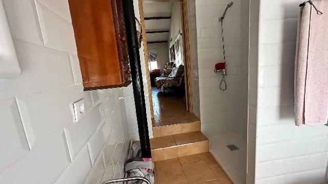 Imagen 22 Inmueble 305043 - Casa Aislada en venta en Pinarnegrillo / Fachada de cemento con revestimiento de piedra