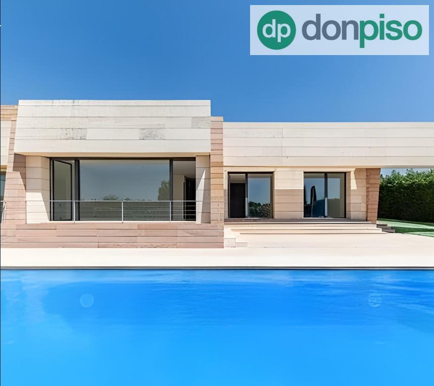 Imagen 1 Casa Aislada en venta en Pozuelo De Alarcón / Prestigiosa Urbanización La Finca 