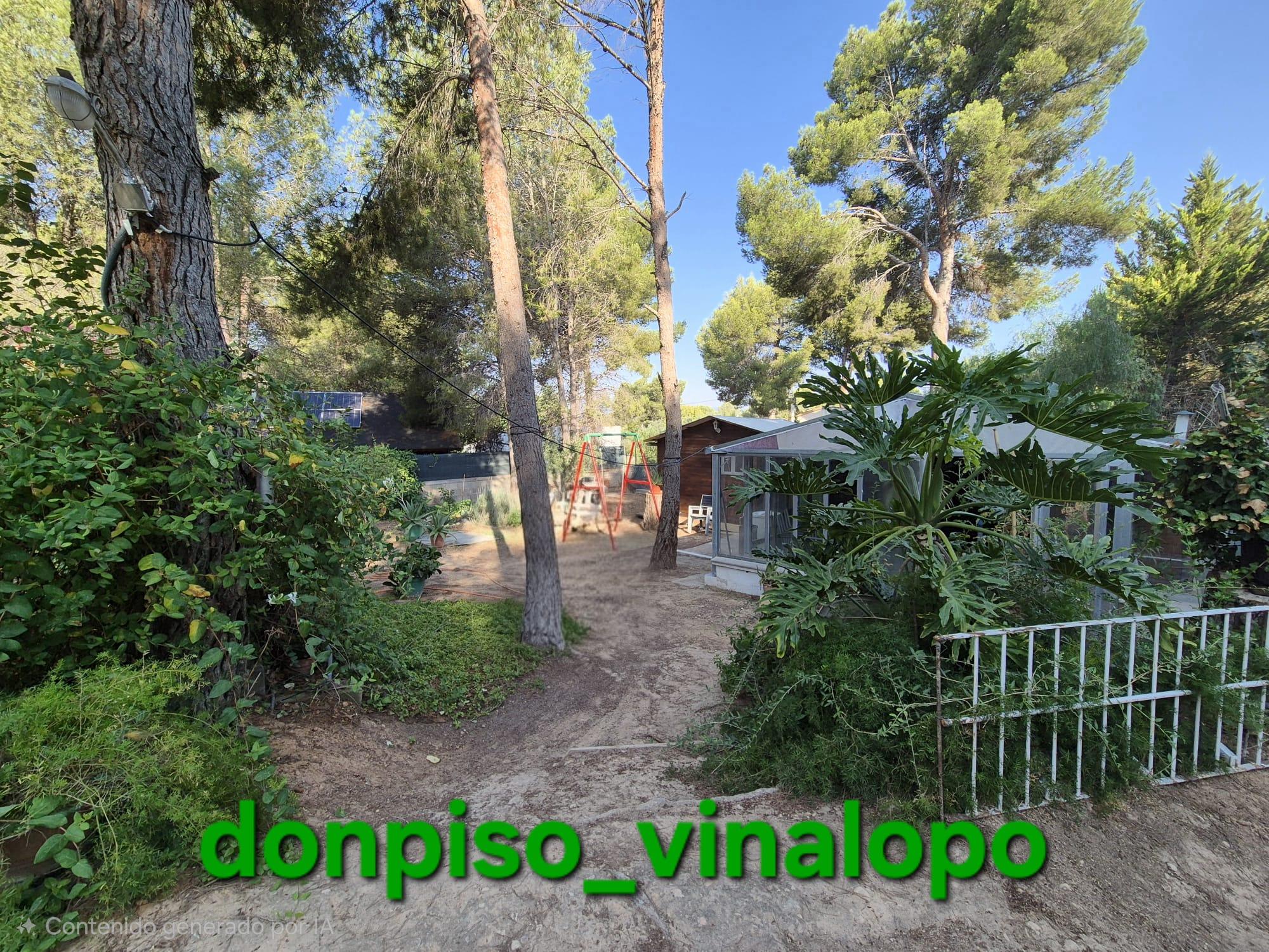 Imagen 1 Casa Rústica en venta en Tibi / Parcela vallada con 2 casas madera y vivienda modular 