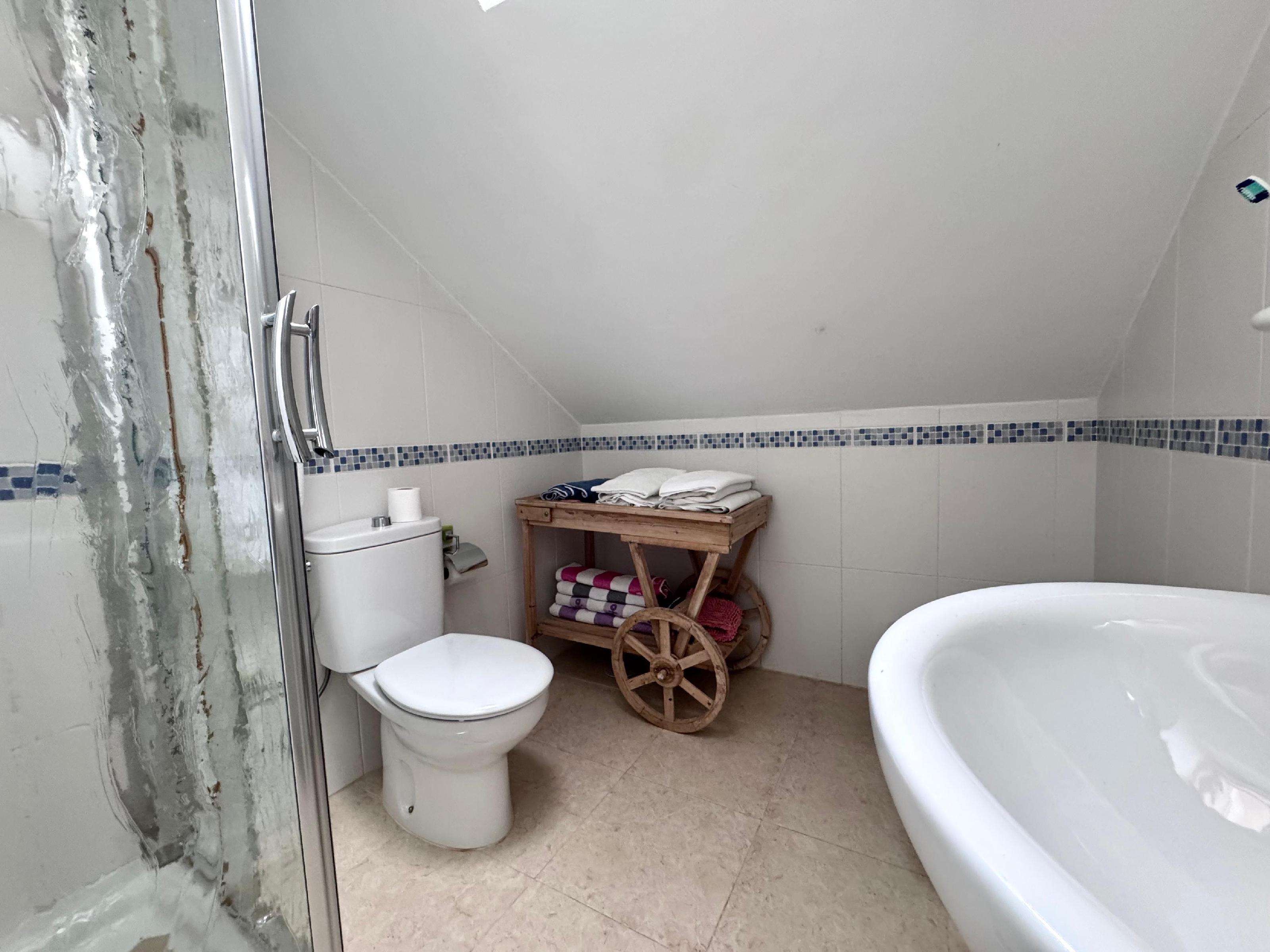 Imagen 7 Casa Adosada en venta en Benalmádena / Casa con piscina independiente