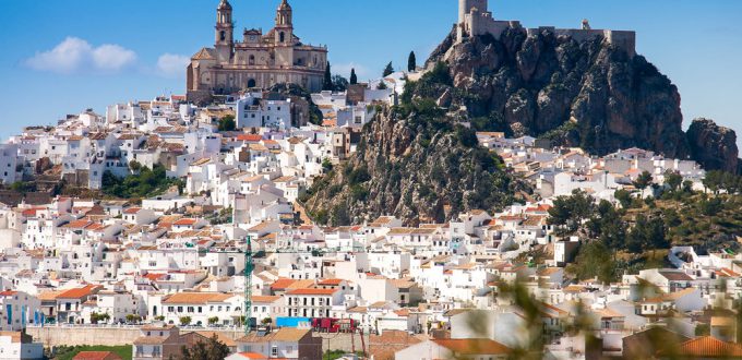 Olvera is a white village (pueblo blanco) in Sierra de Grazalema, Cadiz province, Andalucia, Spain - the Parroquia de Nuestra Senora de la Encarnacion (the Parish of Our Lady of the Incarnation) and the Moorish castle